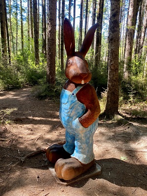 Hanmer Heritage Forest Sculpture Rabbit In Blue Dungarees 300 Pixel High